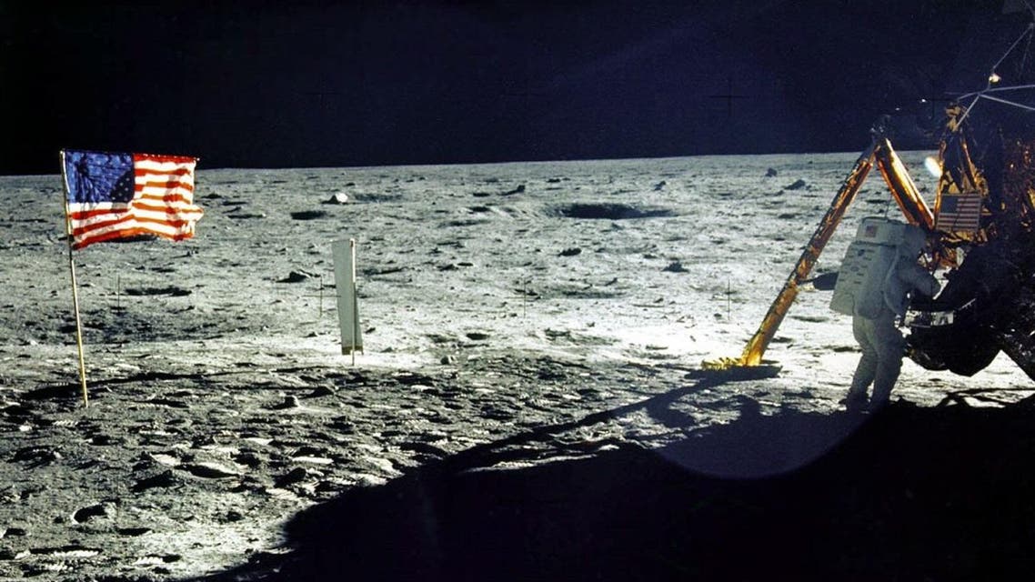 This 20 July, 1969 file photo released by NASA shows the lunar lander and the US flag taken by Apollo 11 astronaut Edwin E. "Buzz" Aldrin, Jr. on the surface of the Moon. (AFP)