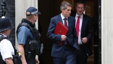 Britain’s Defencse Secretary Gavin Williamson (2R) leaves 10 Downing Street in central London after the weekly cabinet meeting. (File photo: AFP)
