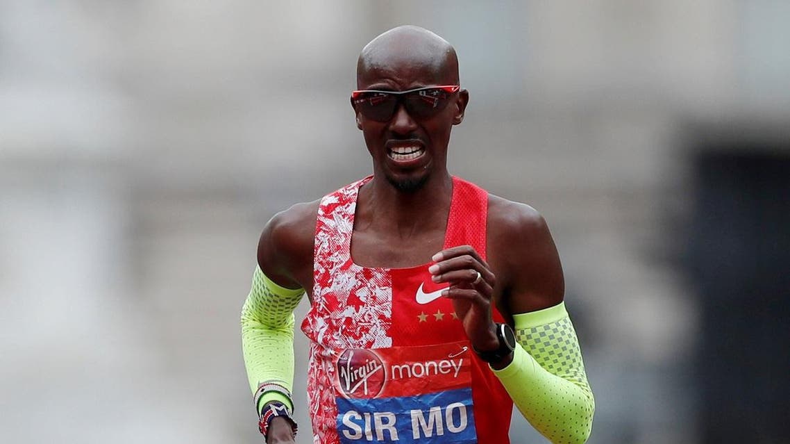 Great Britain's Mo Farah finishes the men's elite race. (Reuters)
