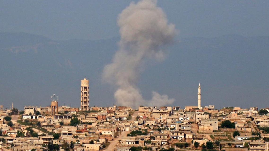 AFP Photo Document reference000_1G29PW SLUGSYRIA - CONFLICT Creation date5/1/2019 CountryIDLIB, SYRIA CreditANAS AL-DYAB / AFP File size/pixels/dpi15.8 Mb / 2968 x 1861 / 300 dpi Smoke billows after reported shelling on the Syrian village of Kfar Nabuda in the northern countryside of Hama governorate on May 1, 2019. (AFP)