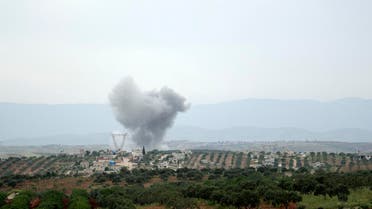 Smoke billows after reported shelling on the Syrian village of Rakaya Sijneh south in the city of Maarat Al-Numan in the Idlib province on May 1, 2019. (AFP)