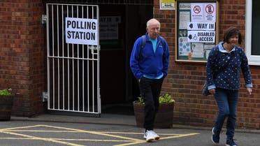 Voters leave a polling station at a community centre in Featherstone, Wolverhampton, north west England as local council elections get underway on May 2, 2019. (AFP)