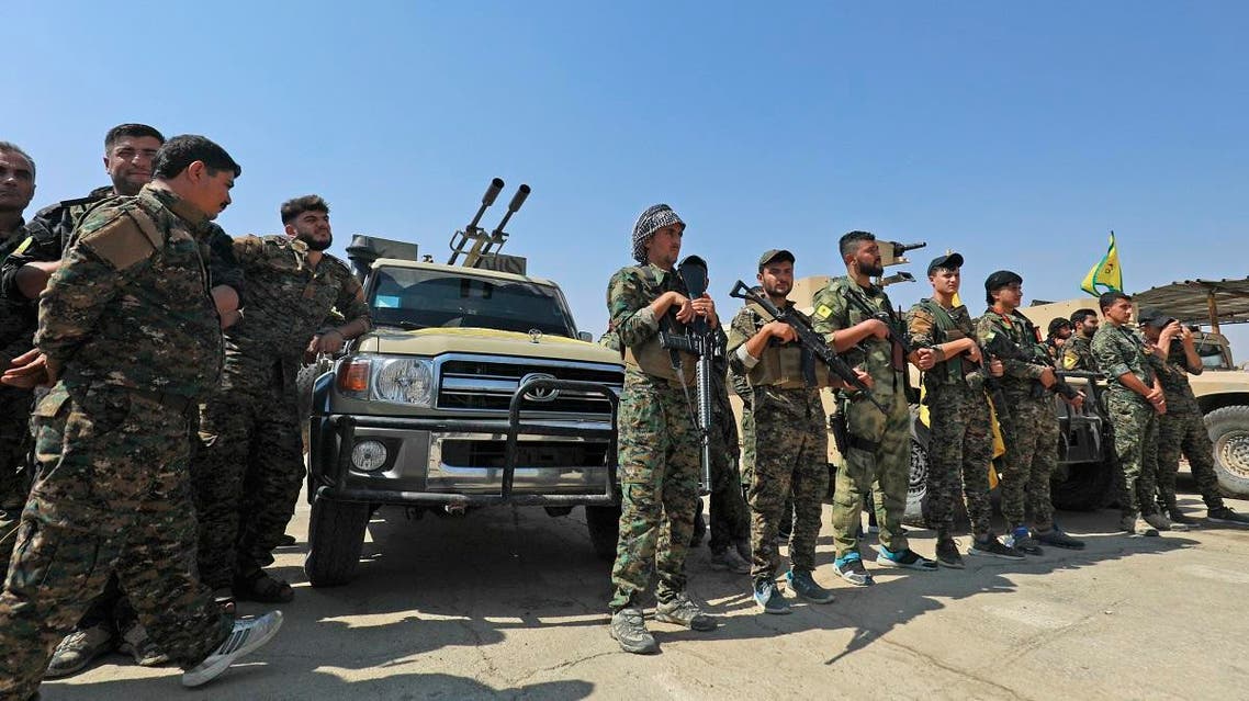 Members of the People’s Protection Units (YPG), part of the of the Syrian Democratic Forces (SDF), gather in the town of Shadadi, about 60 kilometers south of the northeastern Syrian city of Hassakeh. (File photo: AFP)