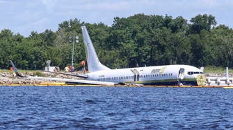 Probe begins after Boeing 737 slides off runway into Florida river