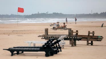 Empty sunbathing chairs are seen on a beach near hotels in a tourist area in Bentota. (Reuters)