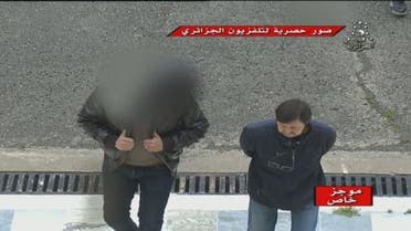 Algerian Television showed the defendants entering the court near a military base, 40 km from Algiers. (Photo courtesy: Algerian Television)
