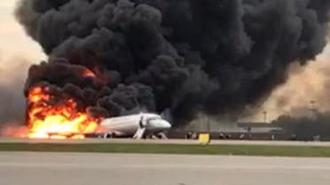 A passenger plane is seen on fire after an emergency landing at the Sheremetyevo Airport outside Moscow, Russia May 5, 2019. (Reuters)