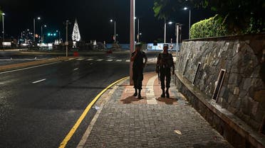Sri Lankan soldiers patrol along a street during a curfew in Colombo on April 22, 2019, a day after the series of bomb blasts targeting churches and luxury hotels in Sri Lanka. (AFP)