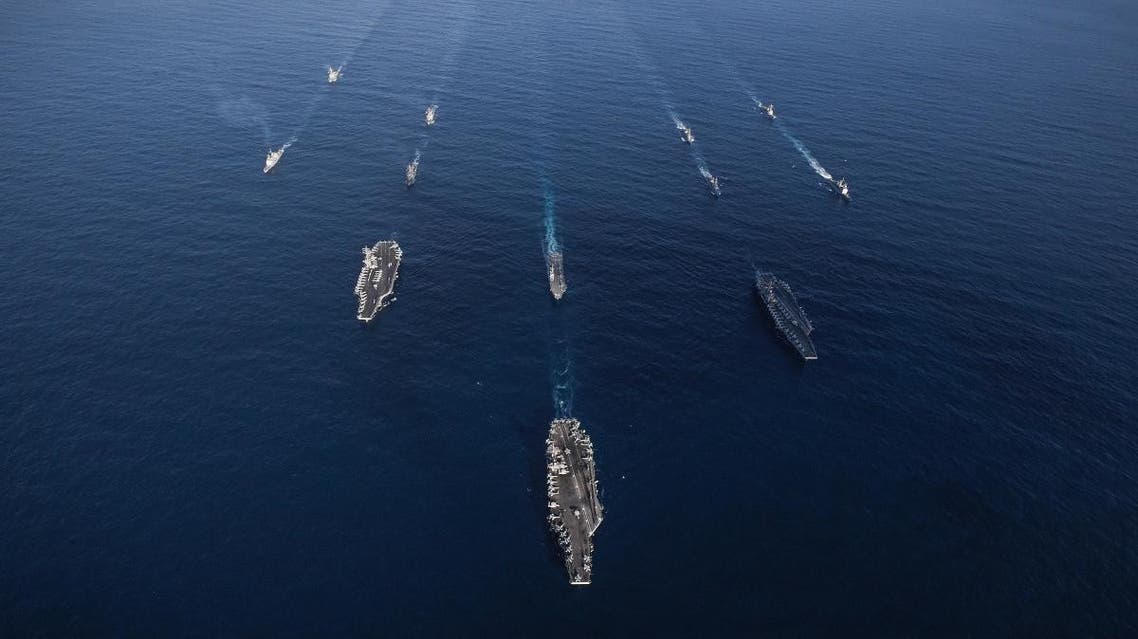 This undated handout photo obtained from the US Navy on November 12, 2017 shows the USS Ronald Reagan (CVN 76), USS Theodore Roosevelt (CVN 71) and USS Nimitz (CVN 68) Strike Groups transitting the Western Pacific with ships from the Japanese Maritime Self-Defense Force. (AFP)