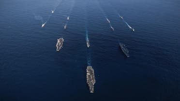 This undated handout photo obtained from the US Navy on November 12, 2017 shows the USS Ronald Reagan (CVN 76), USS Theodore Roosevelt (CVN 71) and USS Nimitz (CVN 68) Strike Groups transitting the Western Pacific with ships from the Japanese Maritime Self-Defense Force. (AFP)