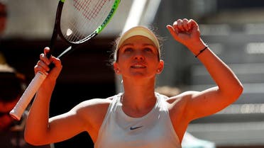 Simona Halep celebrates after winning her semi final match against Belinda Bencic. (Reuters)