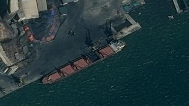 An undated surveillance image provided in a U.S. Department of Justice complaint for forfeiture shows what is described as the North Korean vessel Wise Honest being loaded with coal in Nampo. (Reuters)