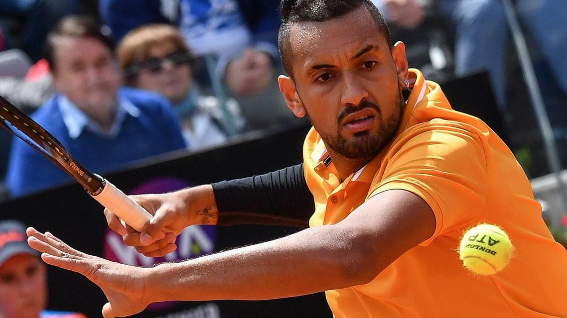 Nick Kyrgios returns the ball to Daniil Medvedev (unseen) during their ATP Masters tournament tennis match at the Foro Italico in Rome on May 14, 2019. (AFP)