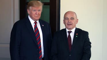 US President Donald Trump welcomes President Ueli Maurer of the Swiss Confederation, upon his arrival for a meeting in the Oval Office on May 16, 2019 in Washington, DC. (AFP)