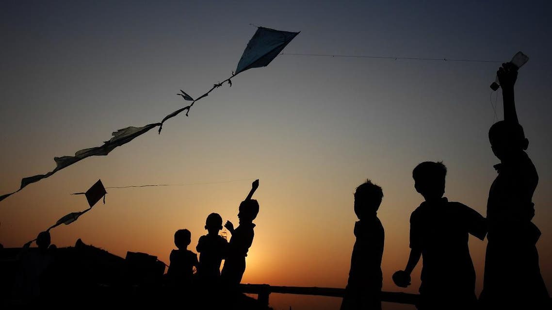 Young Rohingya refugees fly kites at the Hakimpara refugee camp in Bangladesh's Cox's Bazar district on November 18, 2018. (AFP)