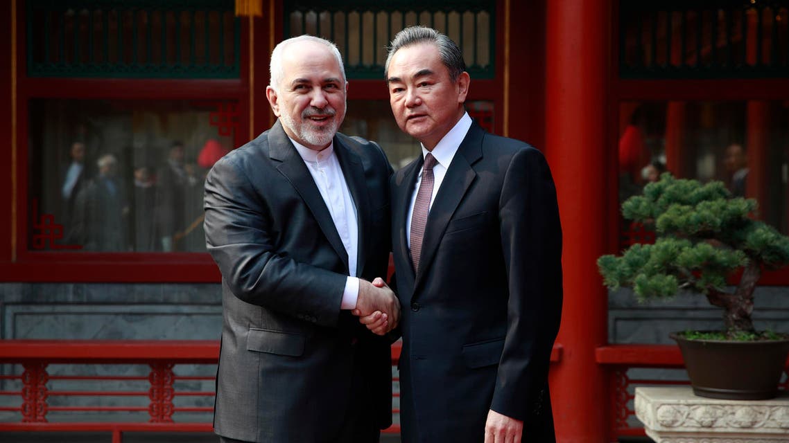 Javad Zarif (L) and his Chinese counterpart Wang Yi in Beijing on February 19, 2019. (AFP)