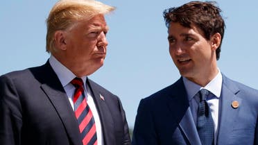 n this June 8, 2018, file photo, President Donald Trump talks with Canadian Prime Minister Justin Trudeau during a G-7 Summit welcome ceremony in Charlevoix, Canada. (AP)