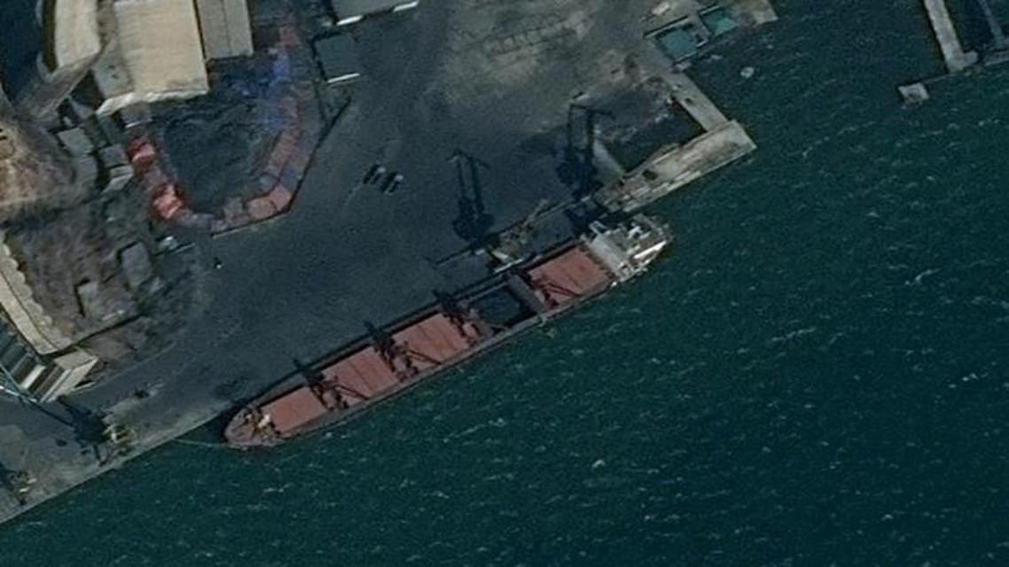 An undated surveillance image provided in a US Department of Justice complaint for forfeiture shows what is described as the North Korean vessel Wise Honest being loaded with coal in Nampo. (Reuters)