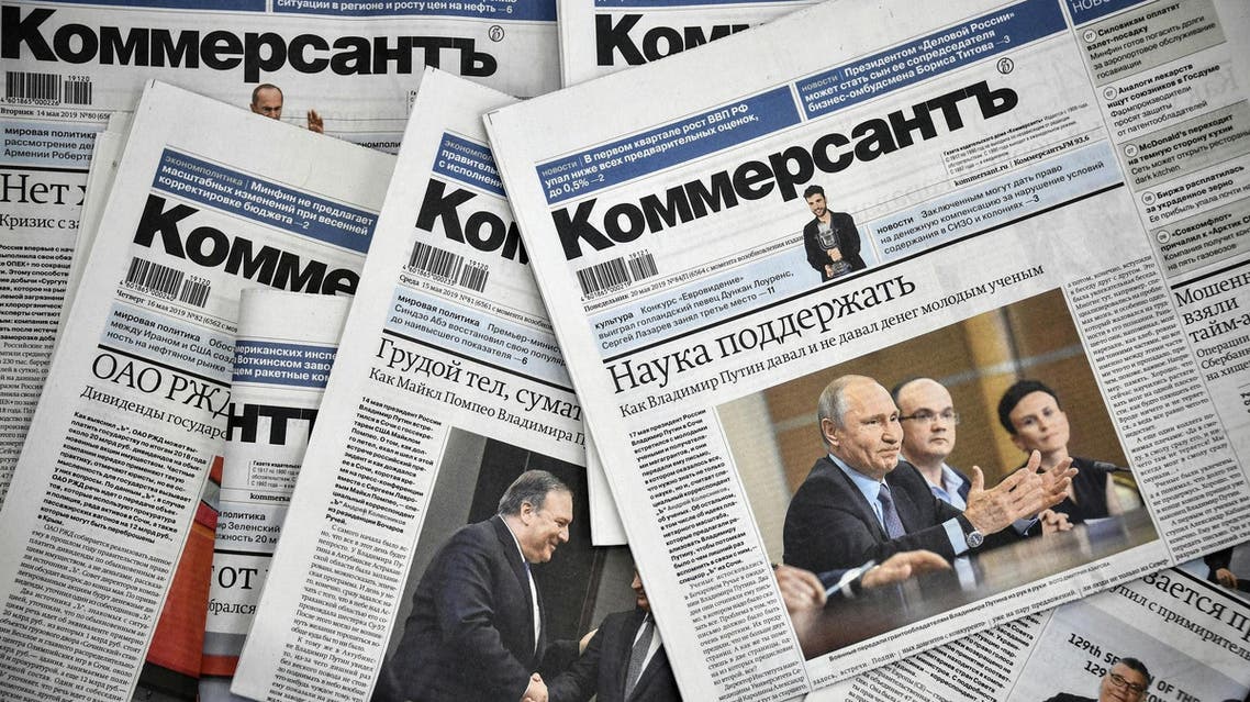 A picture taken on May 20, 2019, shows Kommersant daily newspaper issues. (AFP)
