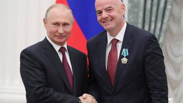 Russian President Vladimir Putin shakes hands with FIFA President Gianni Infantino during an awarding ceremony in the Kremlin in Moscow, Russia, on May 23, 2019. (AP)