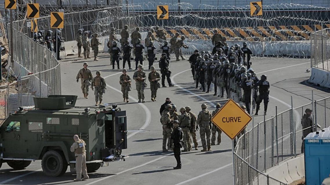 United States Military personel and Border Patrol agents secure the United States-Mexico border on November 25, 2018 at the San Ysidro border crossing point south of San Diego, California. (AFP)