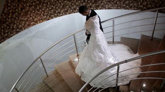 For Gaza grooms, crippling debt overshadows marital bliss