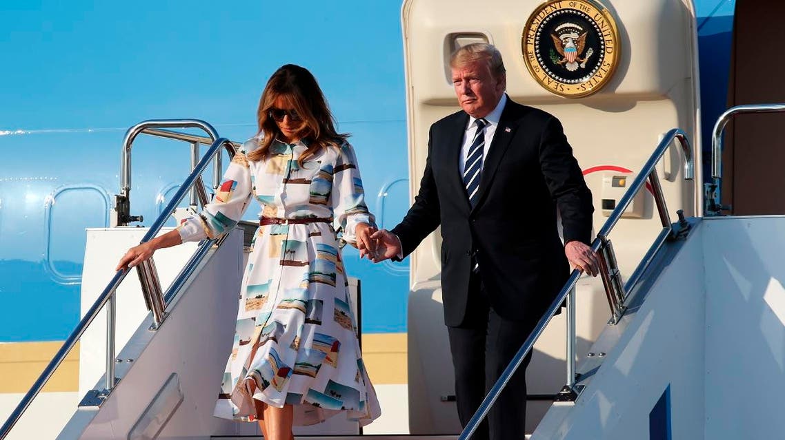 US President Donald Trump and First Lady Melania Trump disembark from Air Force One upon arrival at Haneda international airport in Tokyo on May 25, 2019. Koji Sasahara / POOL / AFP