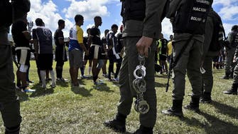 At least 23 inmates dead in clashes with police at Venezuela jail 