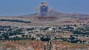 This picture taken on May 17, 2019 from the Syrian town of Qalaat al-Madiq, some 45 kilometres northwest of the central city of Hama, shows bombardment by Syrian government forces on the Shashabo Mountain. (AFP)