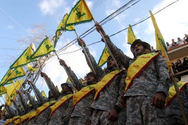 Members of Lebanon's Shiite Hezbollah movement stand at attention during the funeral of a fighter, who was killed in conflict against militant groups in the mountainous area around the Lebanese town of Arsal on the eastern border with war-ravaged Syria, in the southern town of Bisariyeh on August 28, 2017. (File photo: Reuters) 