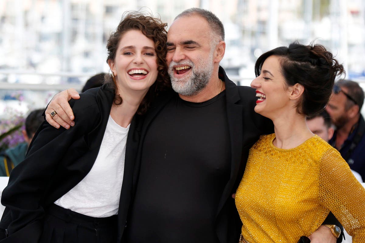 Director Karim Ainouz and cast members Carol Duarte and Julia Stockler pose during the photocall for the film “The Invisible Life of Euridice Gusmao”. (Reuters)
