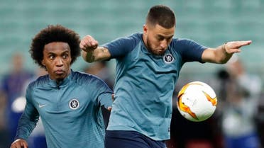 Chelsea’s Eden Hazard controls the ball in front of teammate Willian during a soccer training session at the Olympic stadium in Baku, Azerbaijan, Tuesday May 28, 2019. (AP)