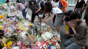 Japan police search home of stabbing attacker