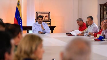 Venezuela's President Nicolas Maduro (C) speaking during a meeting with members of his cabinet at the Miraflores Palace in Caracas, Venezuela on May 27, 2019. (AFP)