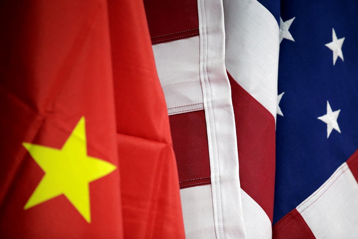 Flags of US and China are displayed at American International Chamber of Commerce (AICC)’s booth during China International Fair for Trade in Services in Beijing, China, May 28, 2019. (Reuters) 
