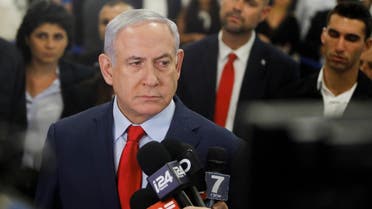 Israeli Prime Minister Benjamin Netanyahu talks to the press following a vote on a bill to dissolve the Knesset on May 29, 2019, at the Knesset in Jerusalem. (AFP)