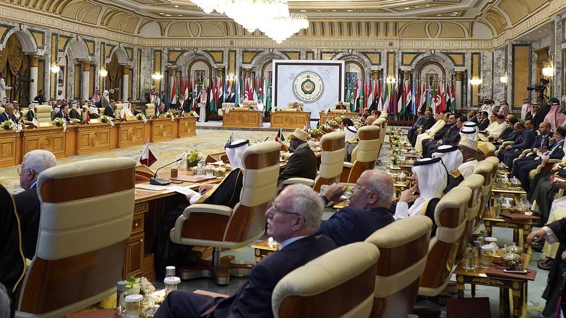 Arab leaders stand during a group photo ahead of the Arab Summit in Mecca