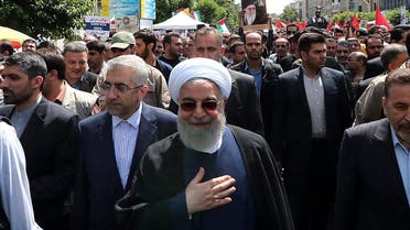 Iranian President Hassan Rouhani attending a parade marking al-Quds (Jerusalem) International Day in Tehran on May 31, 2019. (AFP)