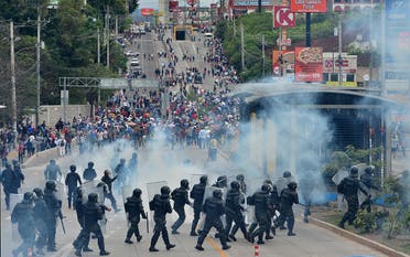 Demonstrators of the education and health sectors protest against government reforms as some clash with riot police in Tegucigalpa, on May 31, 2019. (AFP)