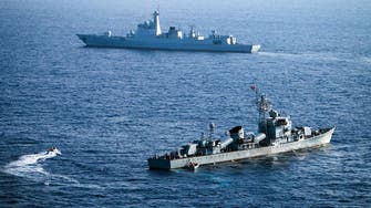 China says it warned away US warship in South China Sea