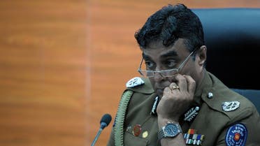 Sri Lanka police chief Pujith Jayasundara looks on after launching the first on-line service delivery of the Sri Lankan police at the headquarters in Colombo on March 7, 2017. (AFP)