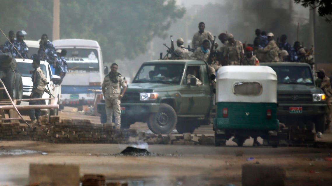 Sudanese forces deployed around Khartoum’s army headquarters on June 3, 2019. (AFP)