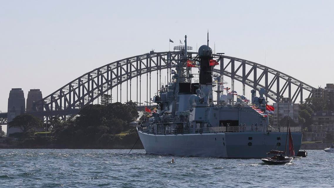 Chinese warships Plan Qingdao anchors in front of the Harbor Bridge during the International Fleet review in Sydney, Australia, Friday, Oct. 4, 2013. (AP)