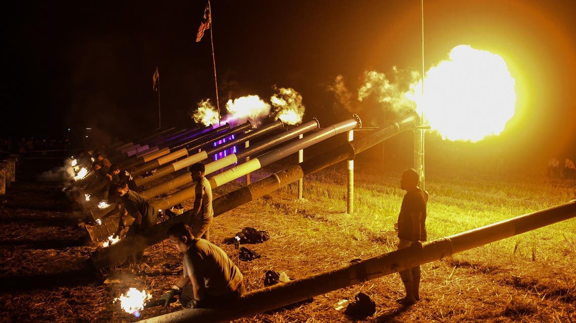 Steel cannons being fired to mark the beginning of Eid celebrations in Kuala Kangsar in the early morning of June 5, 2019. (AFP)