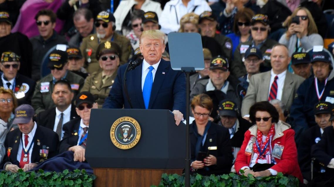 US President Donald Trump delivers a speech in front of US WWII veterans during a French-US ceremony at the Normandy American Cemetery and Memorial in Colleville-sur-Mer, Normandy, northwestern France, on June 6, 2019. (AFP)