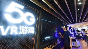A man plays a 5G virtual reality (VR) game at a 5G store in Hangzhou, China's Zhejiang province on June 3, 2019. (AFP)