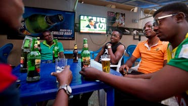 Nigerian men listen to television updates on the election results in the Sabon Gari neighborhood of Kano in Nigeria on March 30, 2015. (File photo: AP)