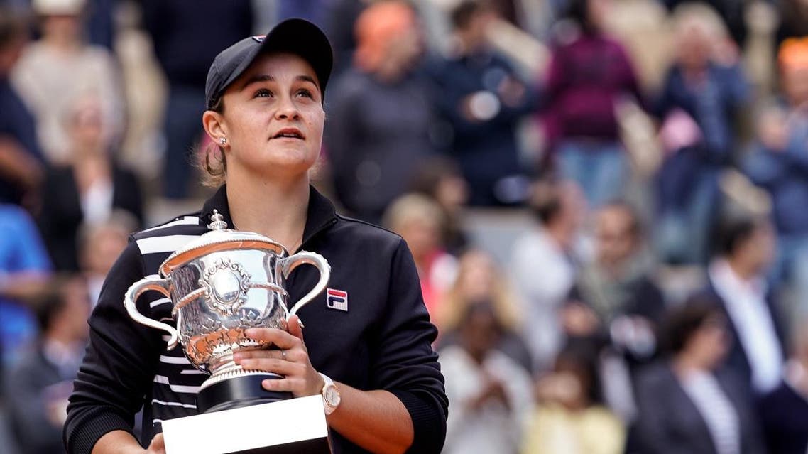 Australia's Ashleigh Barty poses with the trophy Suzanne Lenglen after winning against Czech Republic's Marketa Vondrousova at the end of the women's singles final match on day fourteen of The Roland Garros 2019 French Open tennis tournament in Paris on June 8, 2019. (AFP)