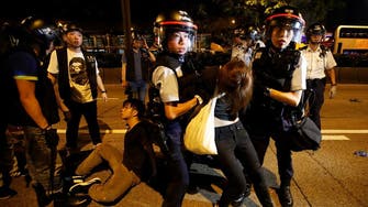 Violence breaks out as police try to clear Hong Kong protesters