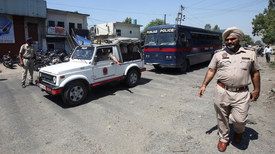 A police bus carrying the men accused of rape and murder of an eight-year-old girl in Kathua, near Jammu, arrives at a court in Pathankot, in the northern state of Punjab, India June 10, 2019. (Reuters)